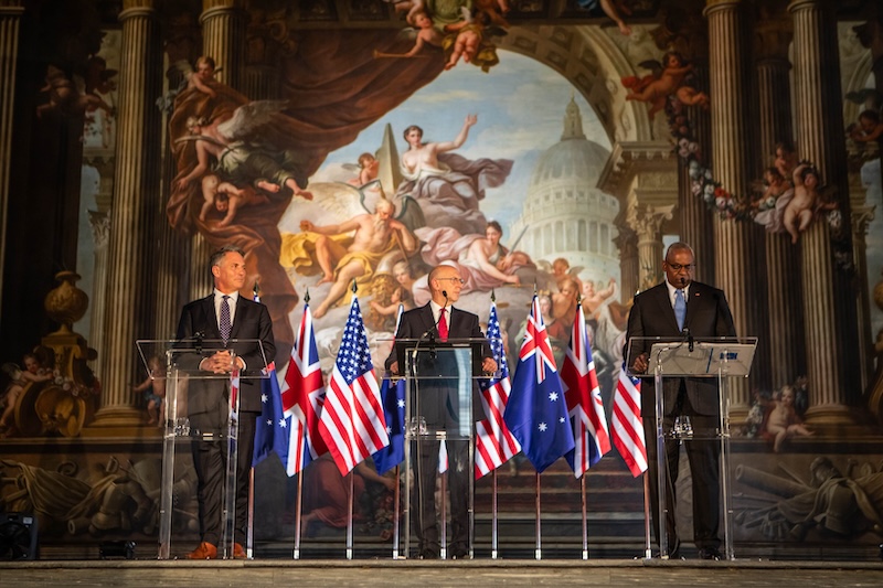 Australia Deputy Prime Minister Richard Marles (left), UK Defence Secretary John Healey (centre), and US Secretary of Defense Lloyd Austin III (right) addressing the media in the Painted Hall at the Old Royal Naval College, Greenwich UK.