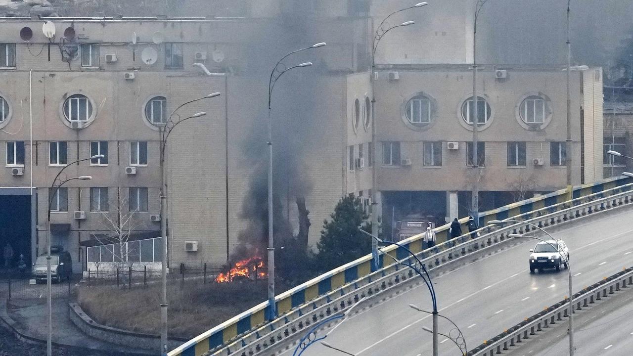 Smoke and flame rise near a military building in Kyiv