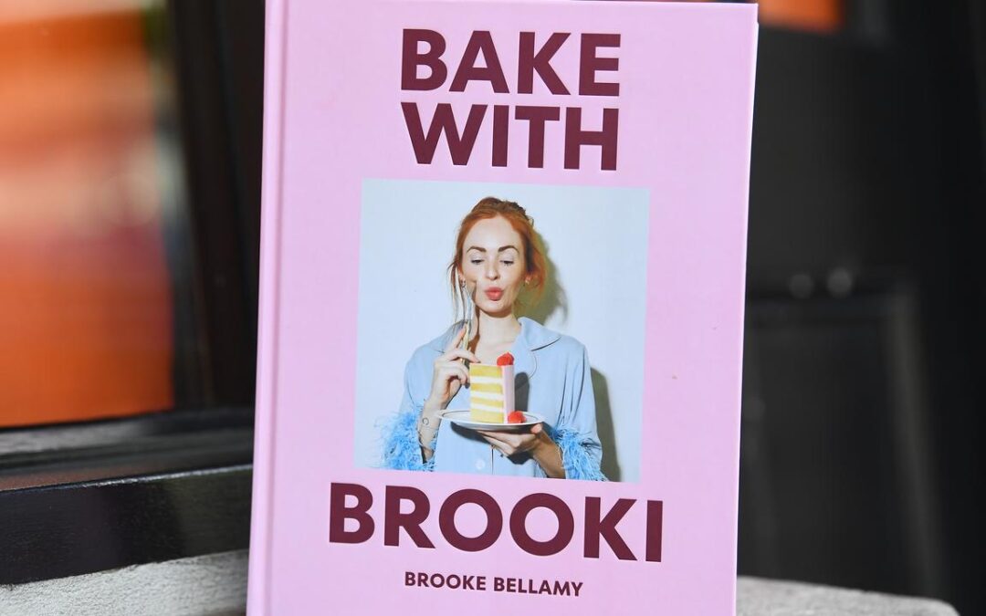 Viral baker maintains innocence amid author food fight