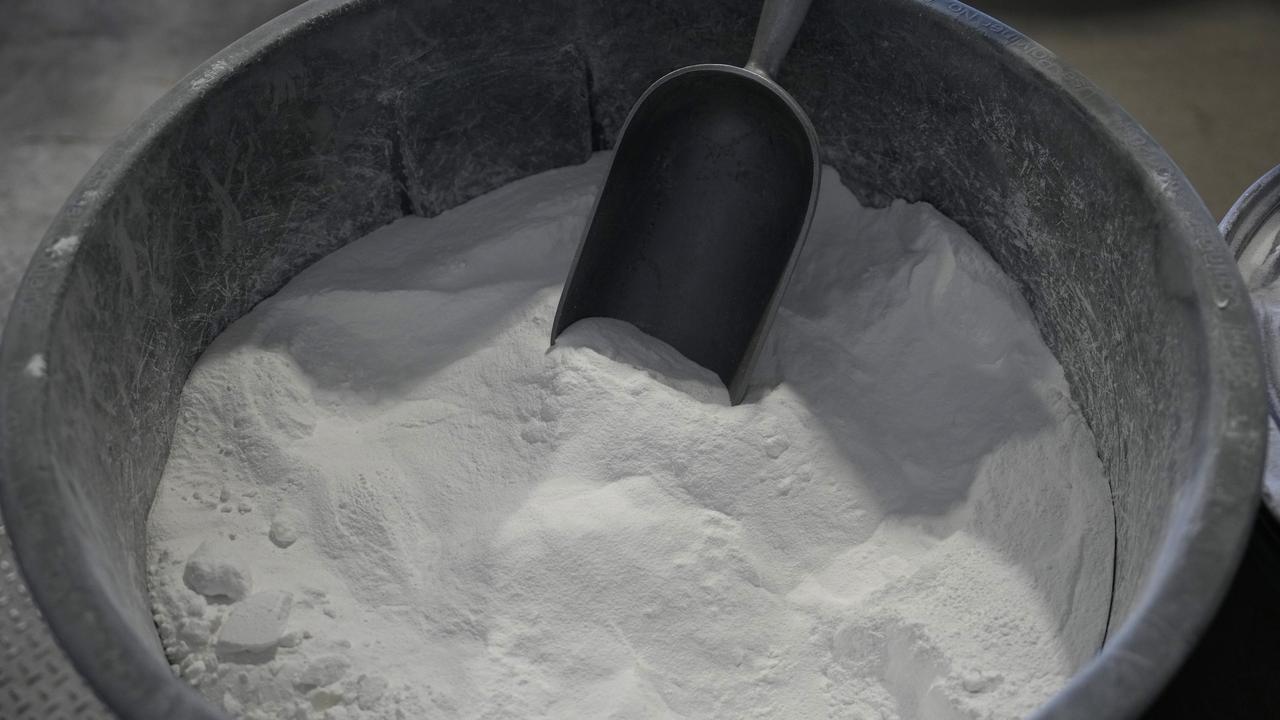 Lithium carbonate in a a container