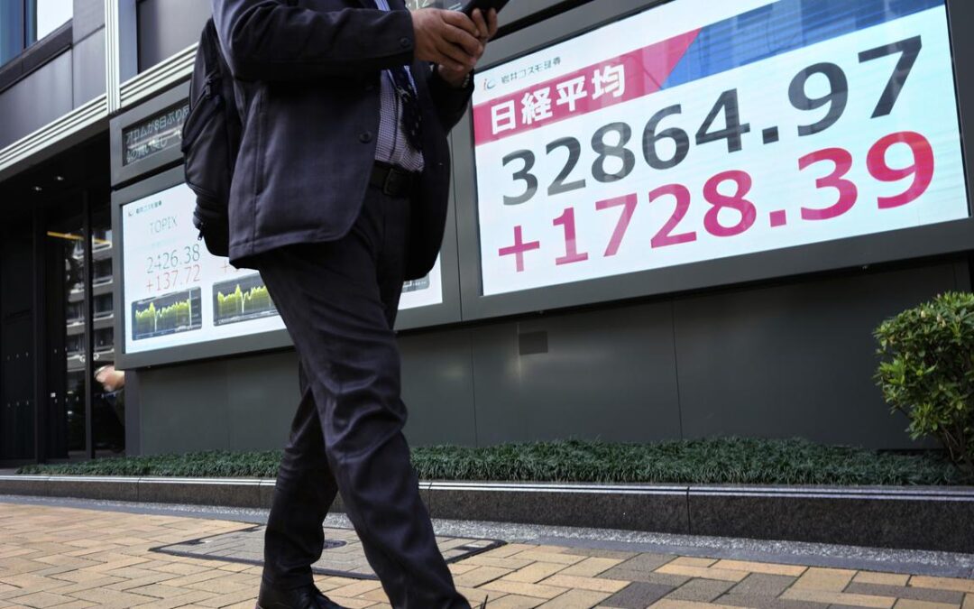 Stocks slide in Asia, recession fears pummel sentiment