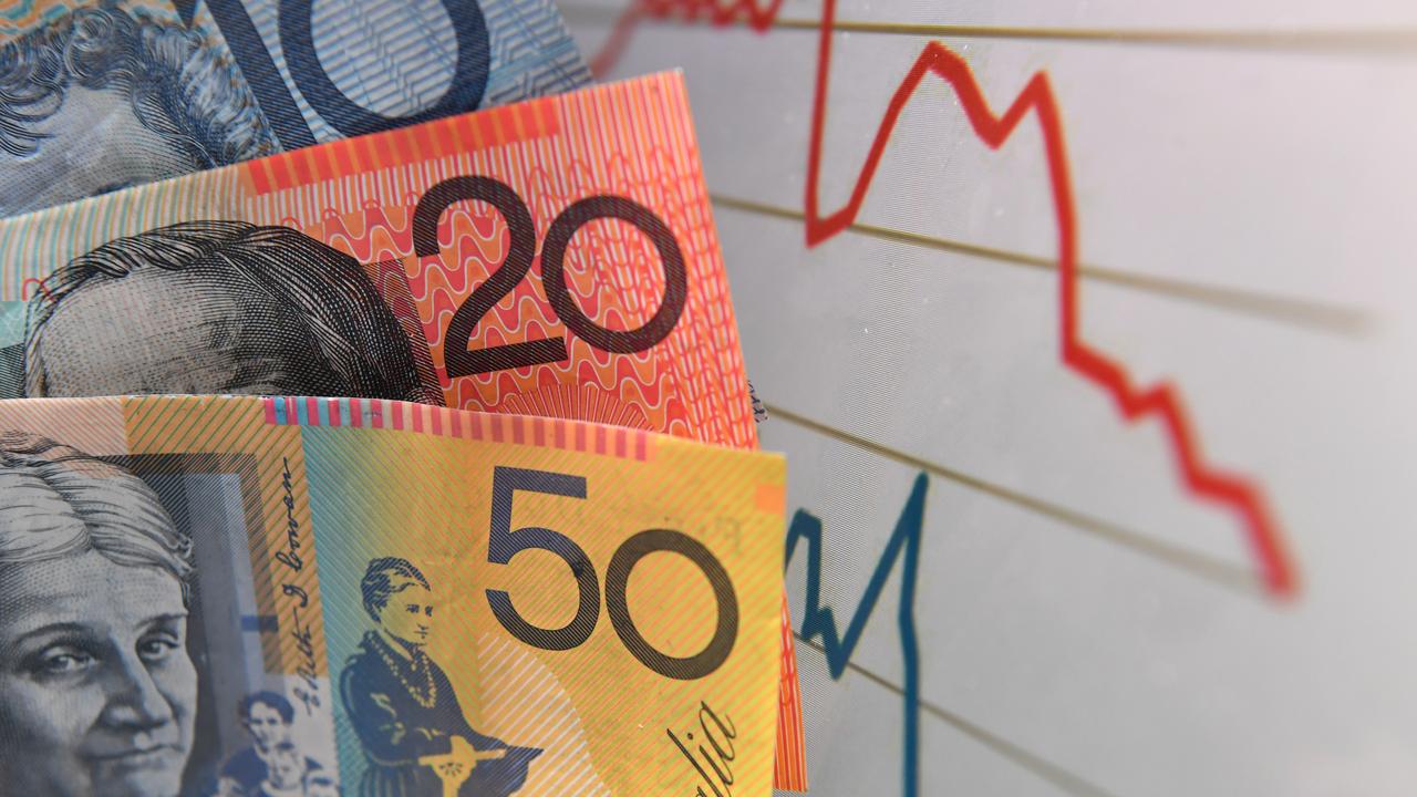 Currency next to a wages graph (file image)