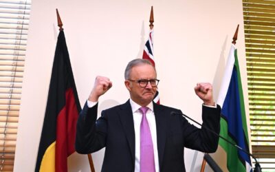 PM rallies troops, urges caucus to focus on Australians