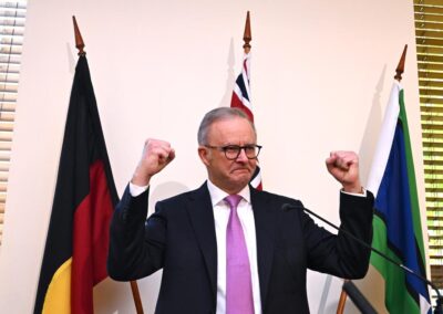 PM rallies troops, urges caucus to focus on Australians
