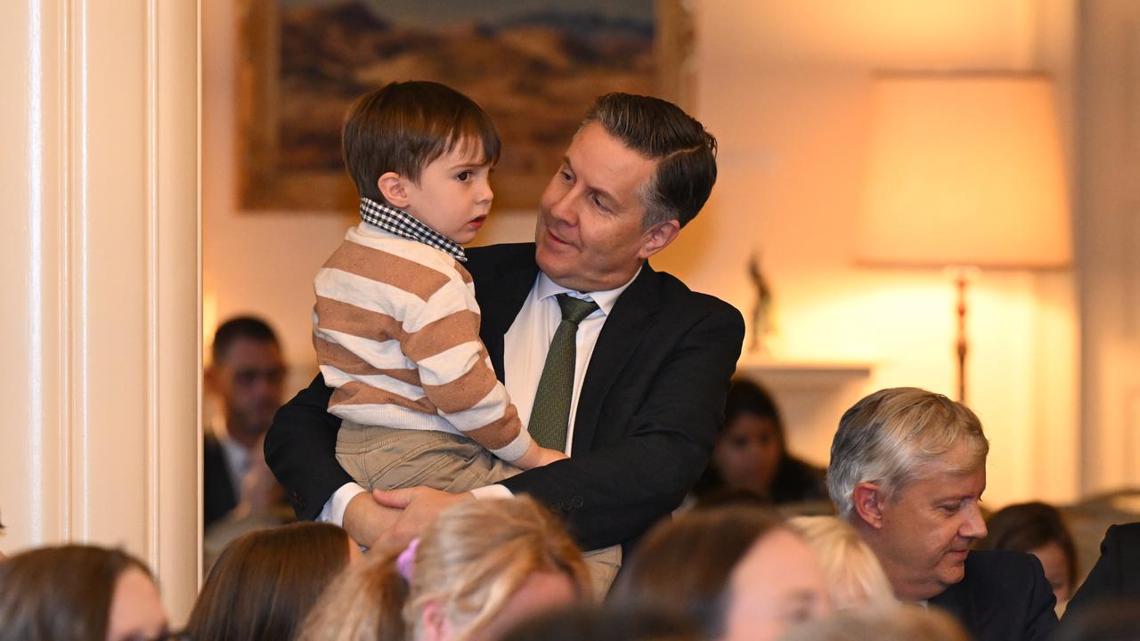 Health Minister Mark Butler holds his son
