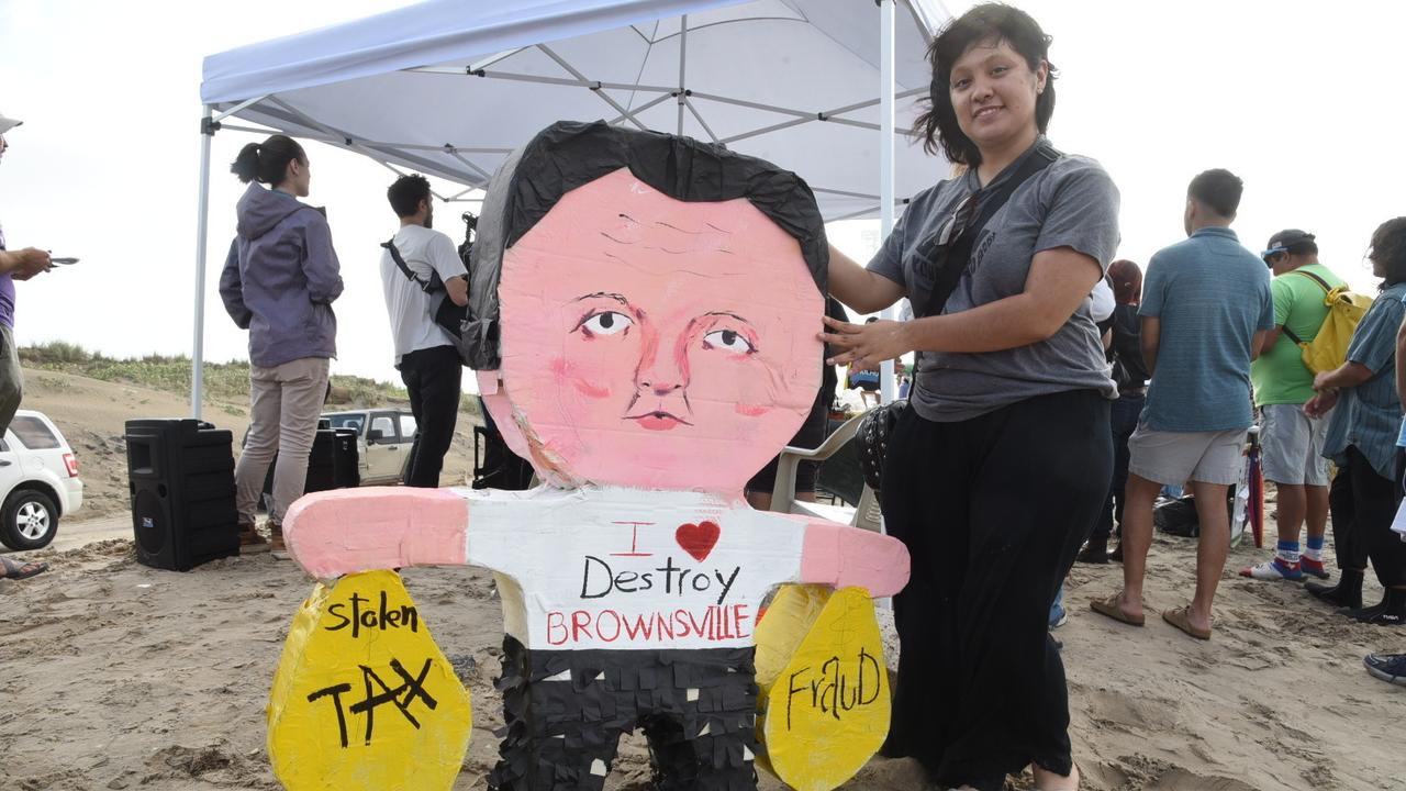 A piñata of Elon Musk during a protest at Boca Chica beach, Texas,