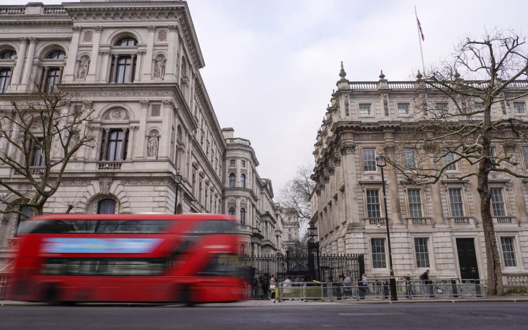 UK to restrict work visas in migration crackdown
