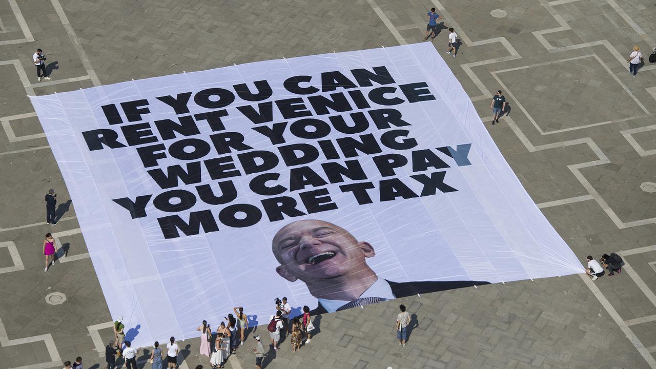 A banner in St Mark Square about Jeff Bezos' planned wedding