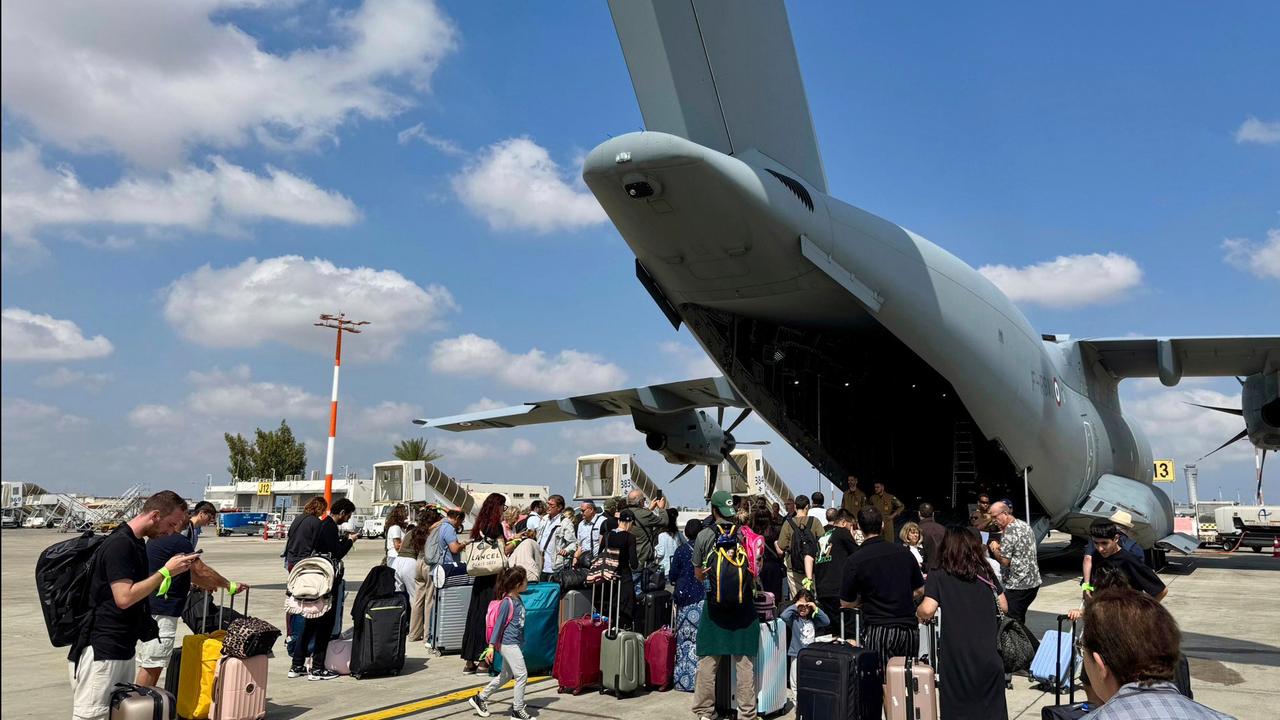 French nationals board a military plane in Tel Aviv, Israel