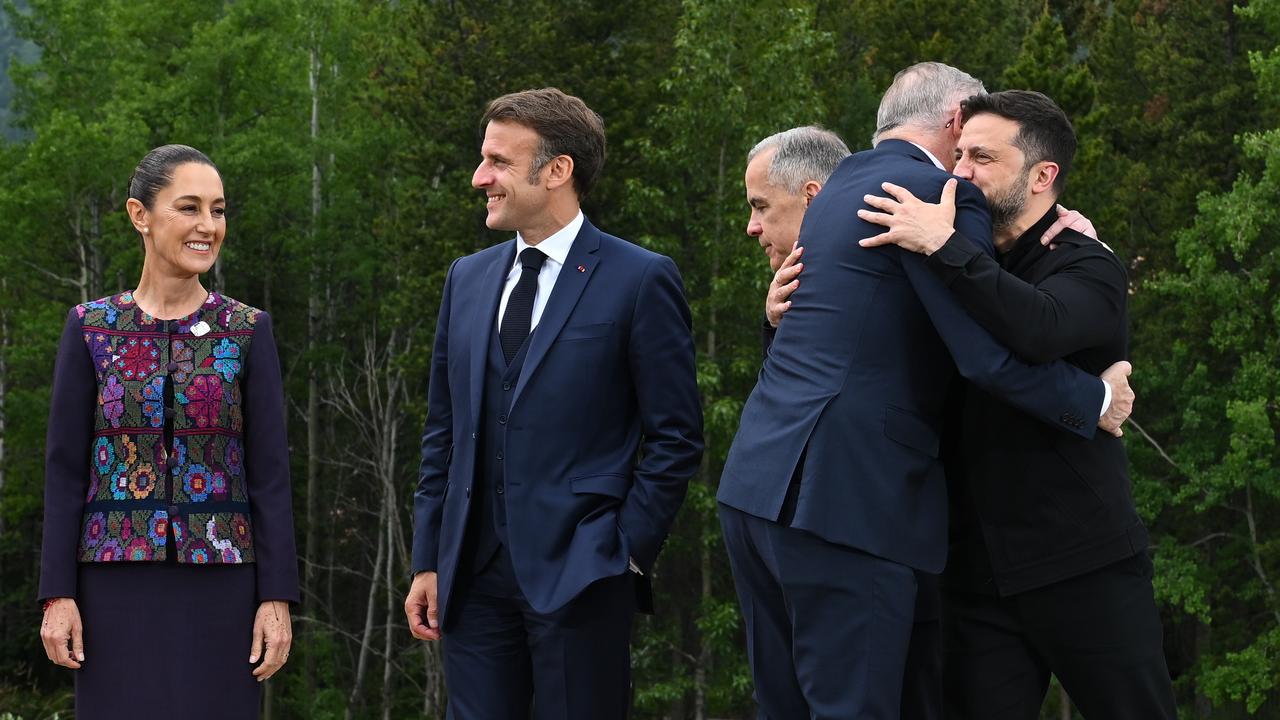 Anthony Albanese embraces Volodymyr Zelenskiy