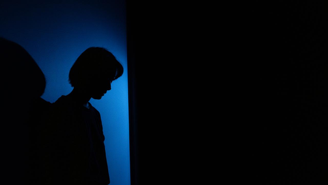 A woman in shadows