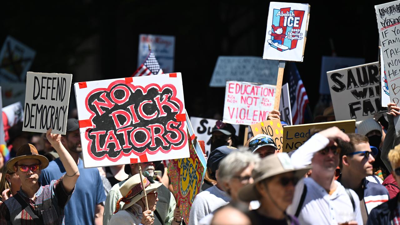 Demonstrators attend a 'No Kings' protest in Seattle