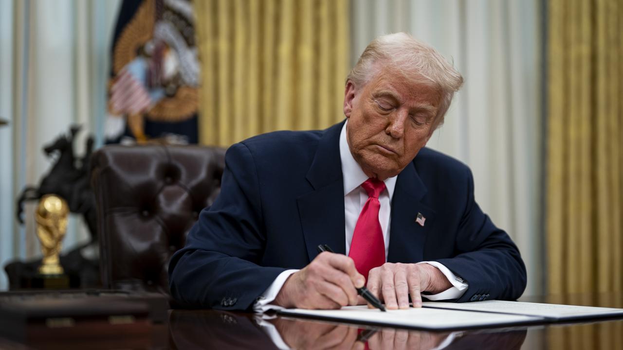 US President Trump signs