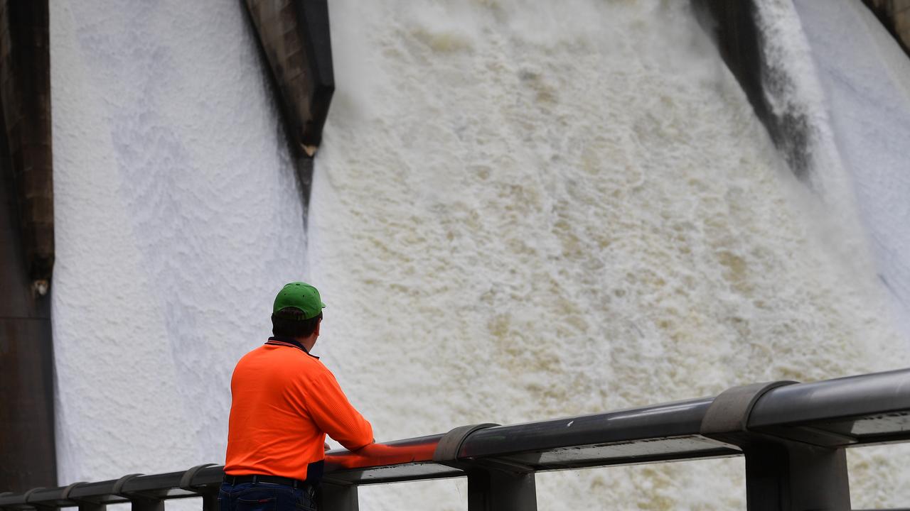 A Water NSW worker monitors the spillway