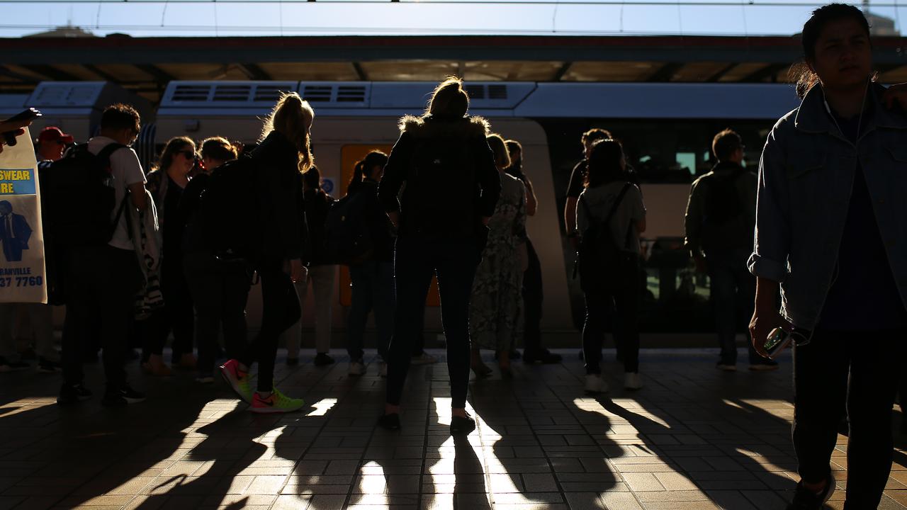 Commuters on train platform