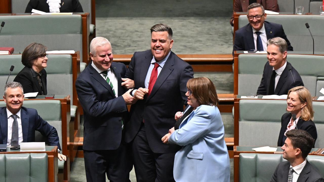 Reelected Speaker of the House Milton Dick dragged to speaker's chair