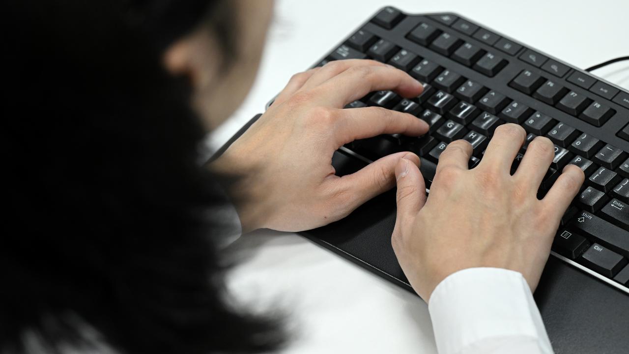 A stock photo of a computer user