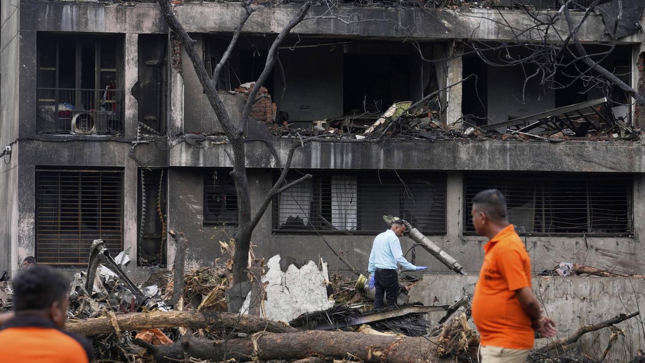 Official inspects the site of an Air India crash in Ahmedabad, India