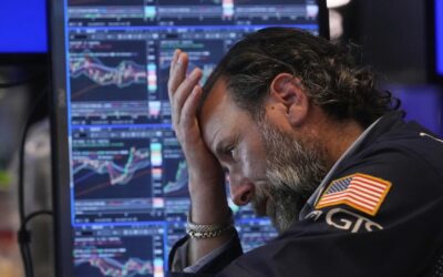 Stocks fall after Trump sets tariff sights on Canada