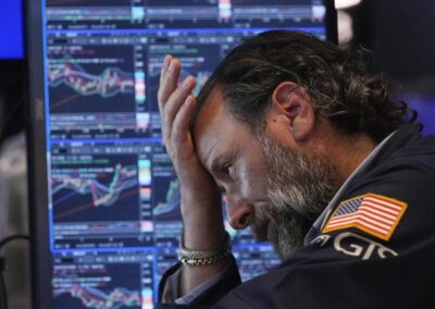 Stocks fall after Trump sets tariff sights on Canada