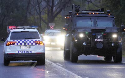 Dangerous terrain hampers search for accused cop killer
