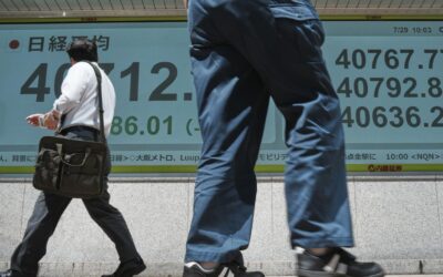 Asia shares choppy as traders await Powell speech