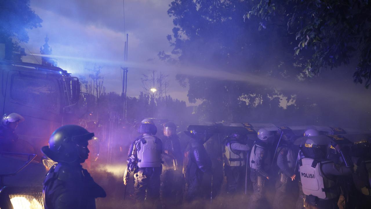 Police during clashes with protesters