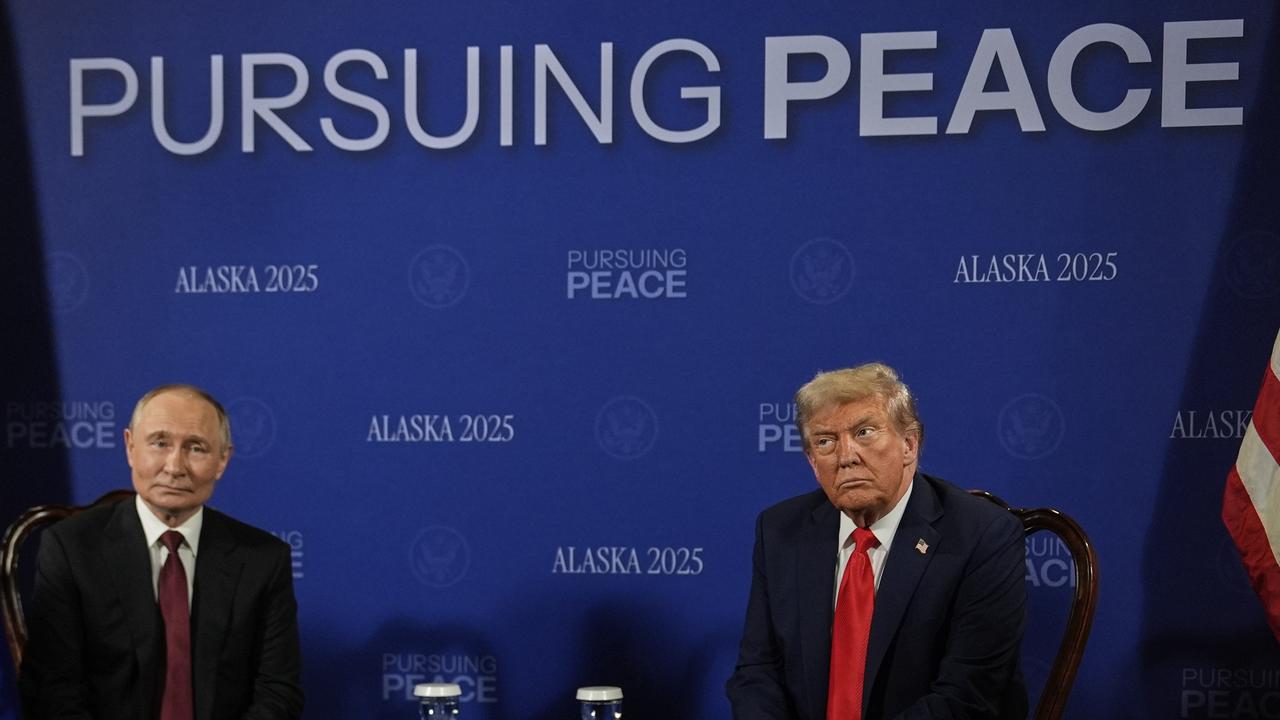 Donald Trump meets with Vladimir Putin