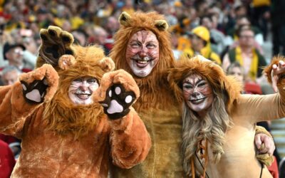 Footy fans help consumer spending roar into growth