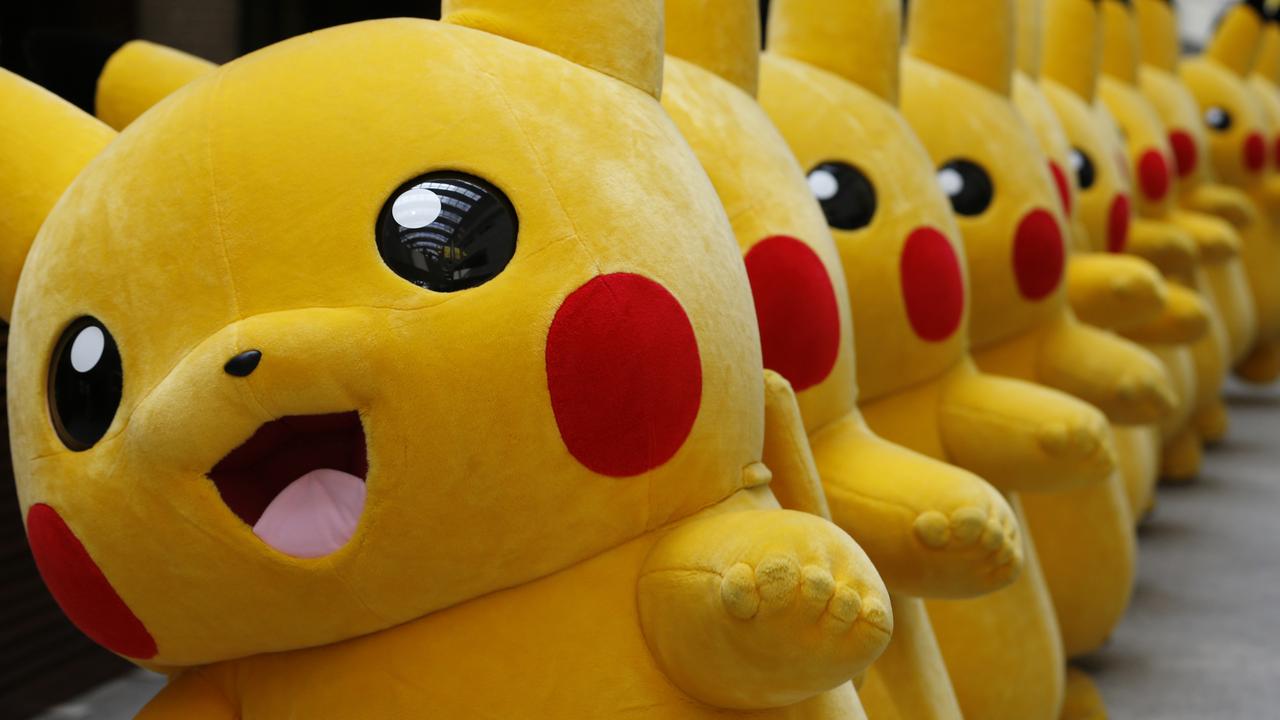 Dozens of Pokemon character Pikachu parade in Yokohama, Japan