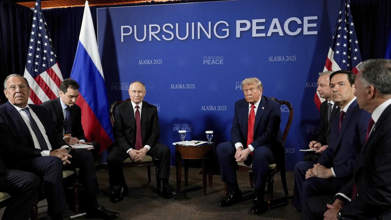 Donald Trump meets with Vladimir Putin