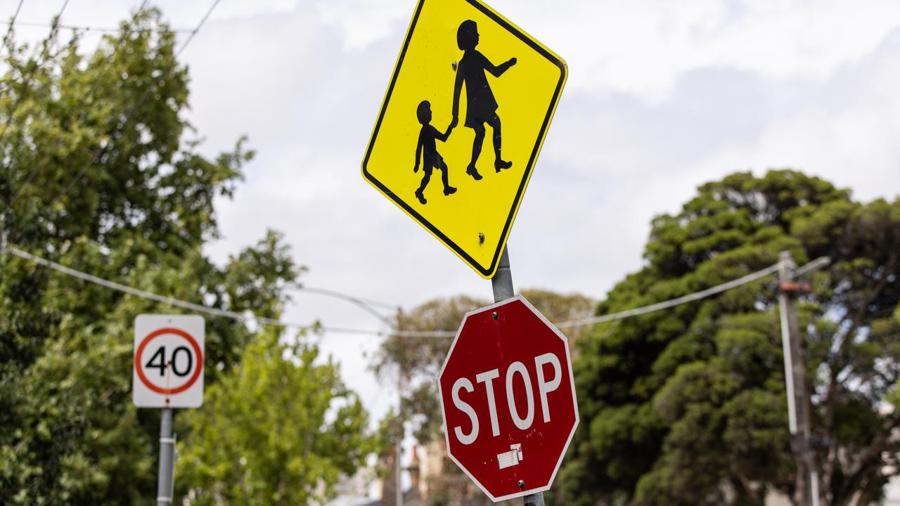 A speed sign is seen in a school zone