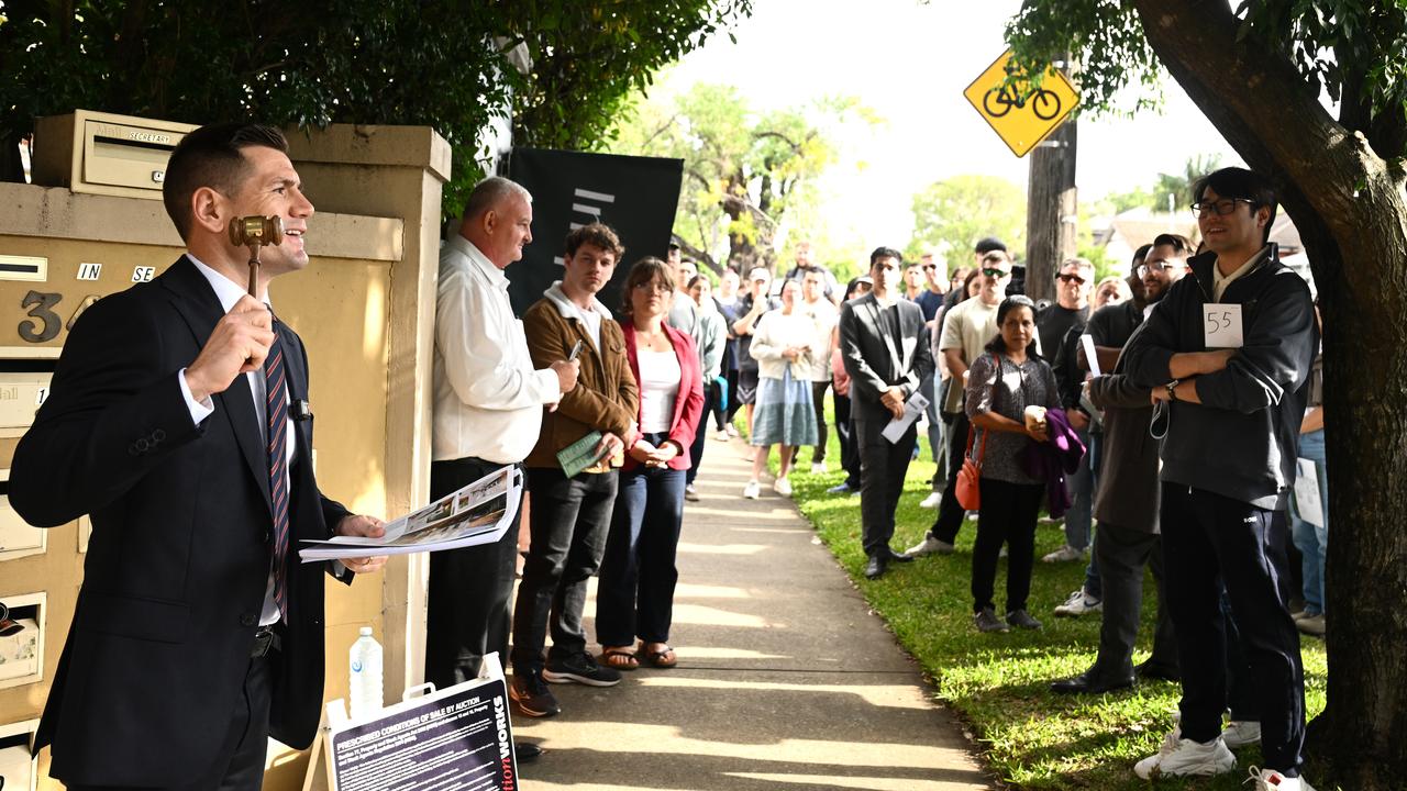 An auctioneer with prospective buyers (file image)