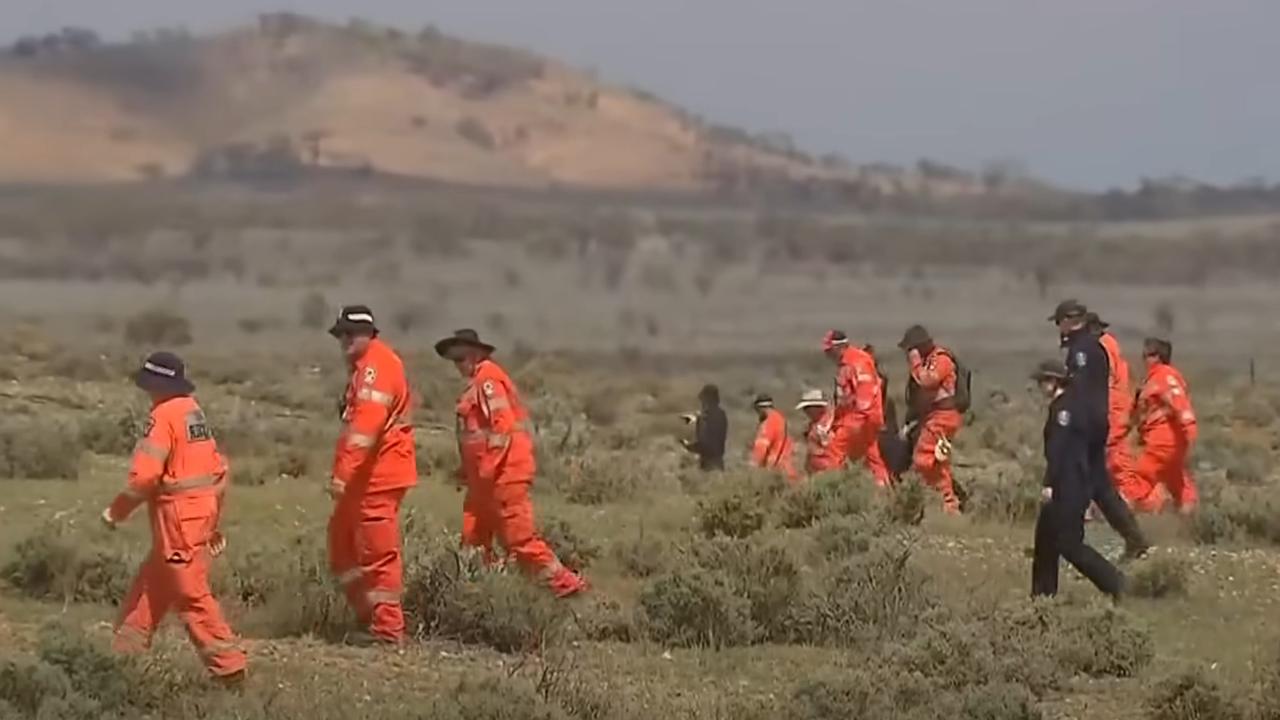 Police and SES crews searcing for Gus