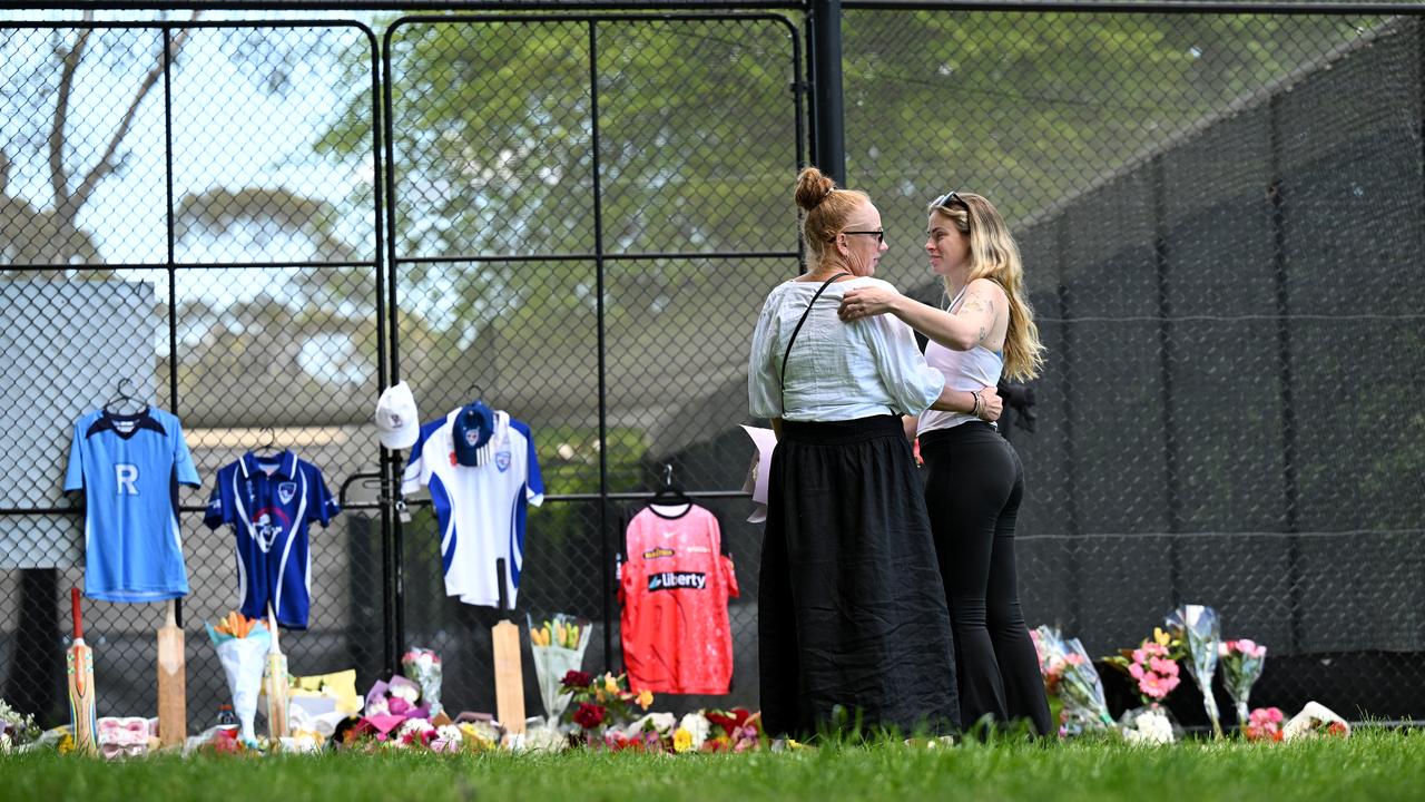 Morners arrive with flowers to the cricket training facility