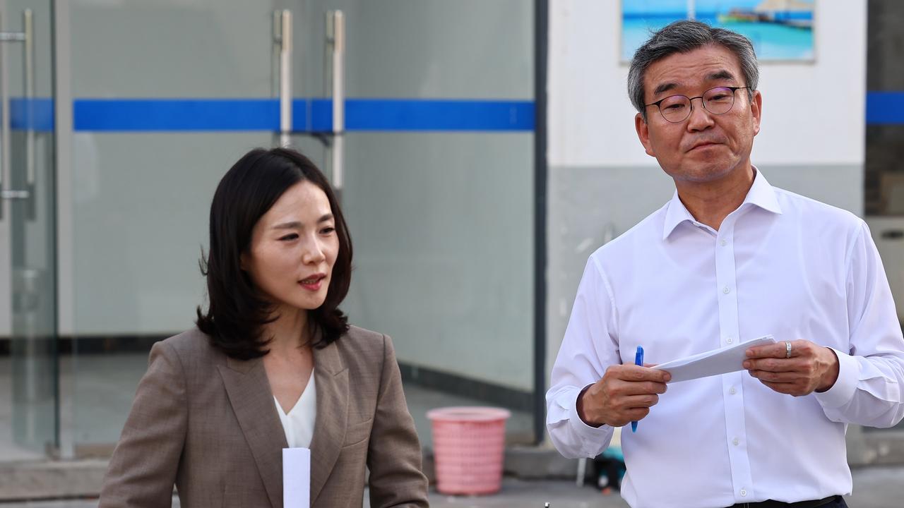 South Korean officials at a press conference