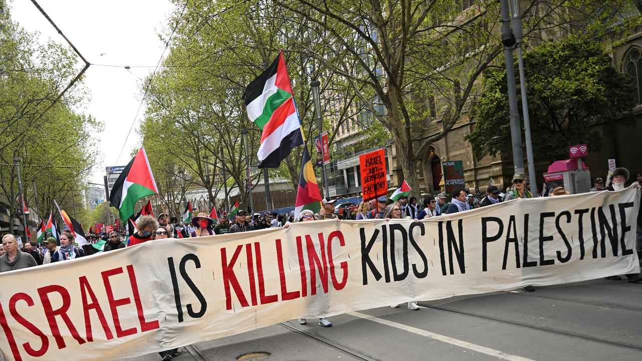 Protesters gather outside of Flinders Street Station