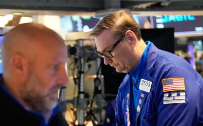 Dow and S&P 500 post record closing highs, Nasdaq eases