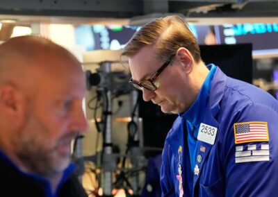 Dow and S&P 500 post record closing highs, Nasdaq eases