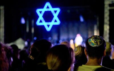 Vigils mark Israel attack anniversary, Gaza death toll