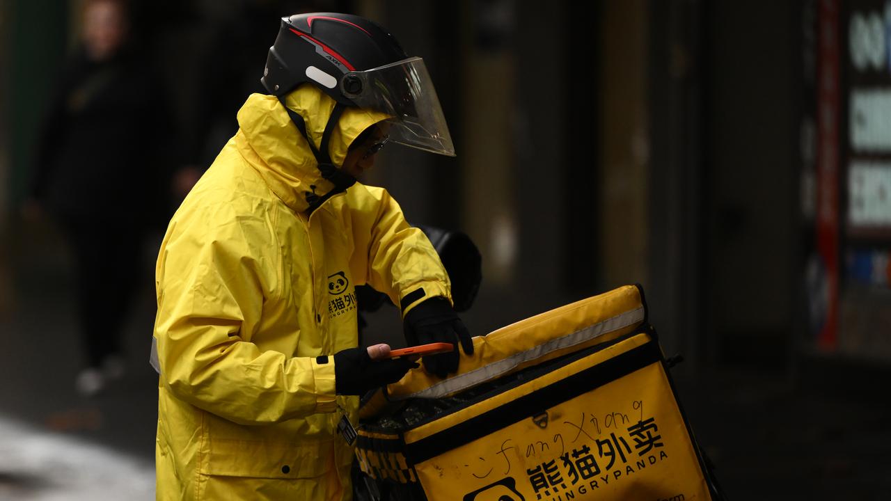 A food delivery worker in the central business district in Melbourne