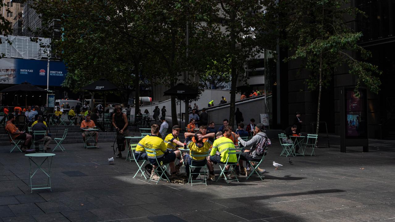 Workers are seen during a break in Sydney