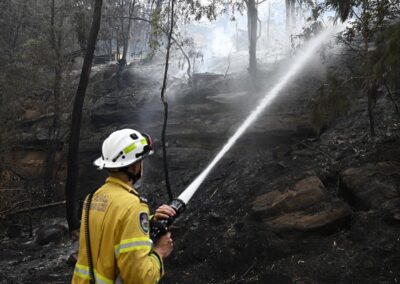 Storms and wind keep fire danger high after homes lost