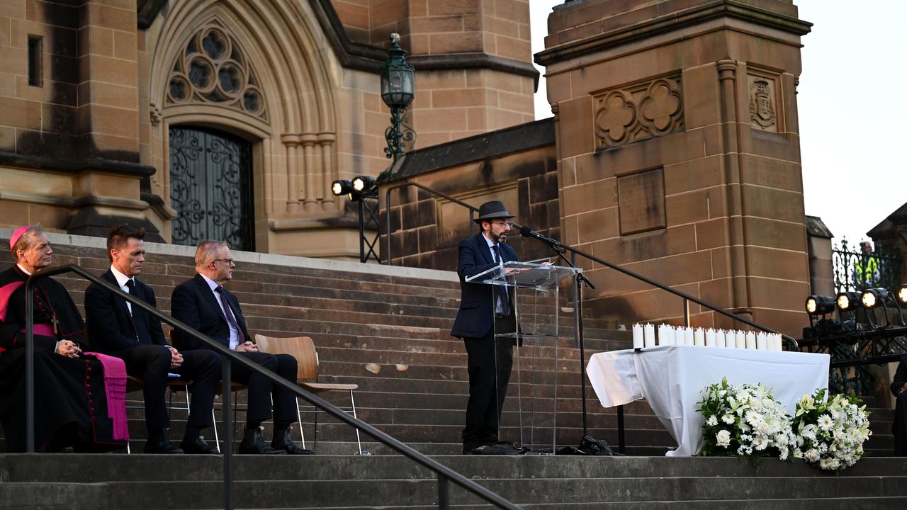 Rabbi Benjamin Elton speaks outside St Mary's Cathedral