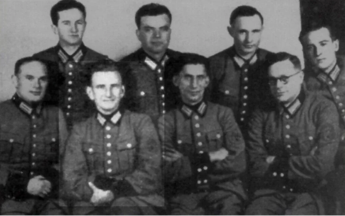 Auxiliary Police leaders with Roman Shukhevych (sitting, second from left), 1942.