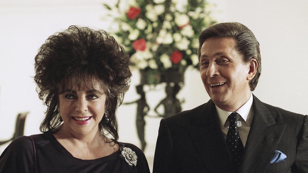 Elizabeth Taylor, left, and designer Valentino Garavani 