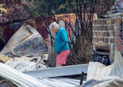 Fire ban remains as residents confront carnage