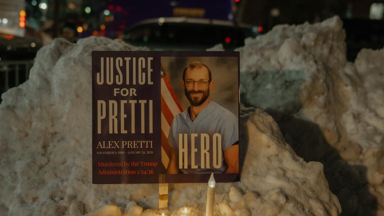 A sign bearing the portrait of Veterans Affairs (VA) nurse Alex Pretti