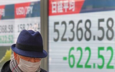 BOJ keeps rates steady, raises growth forecasts