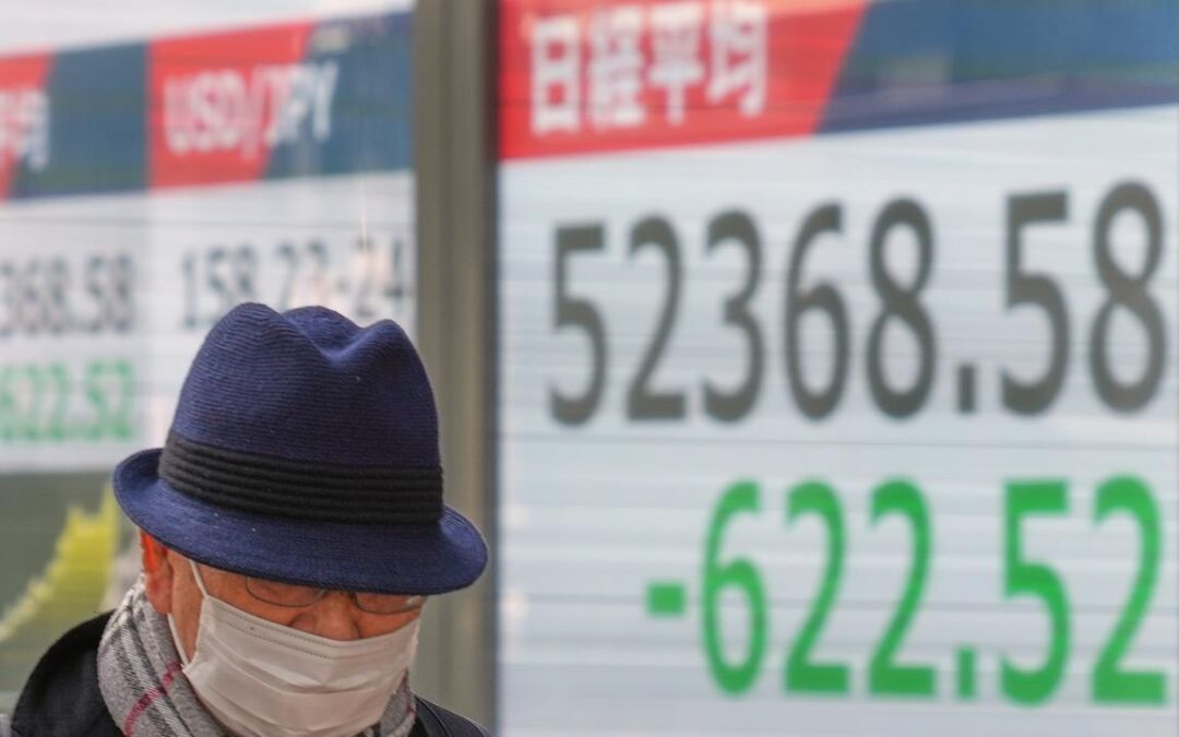 BOJ keeps rates steady, raises growth forecasts